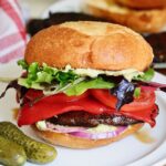 grilled vegan portobello mushroom burger on a plate ready to eat