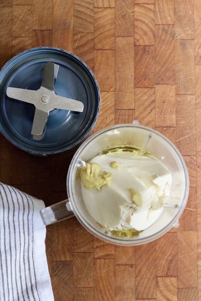 ingredients for tofu mayonnaise in a small blender ready to blend