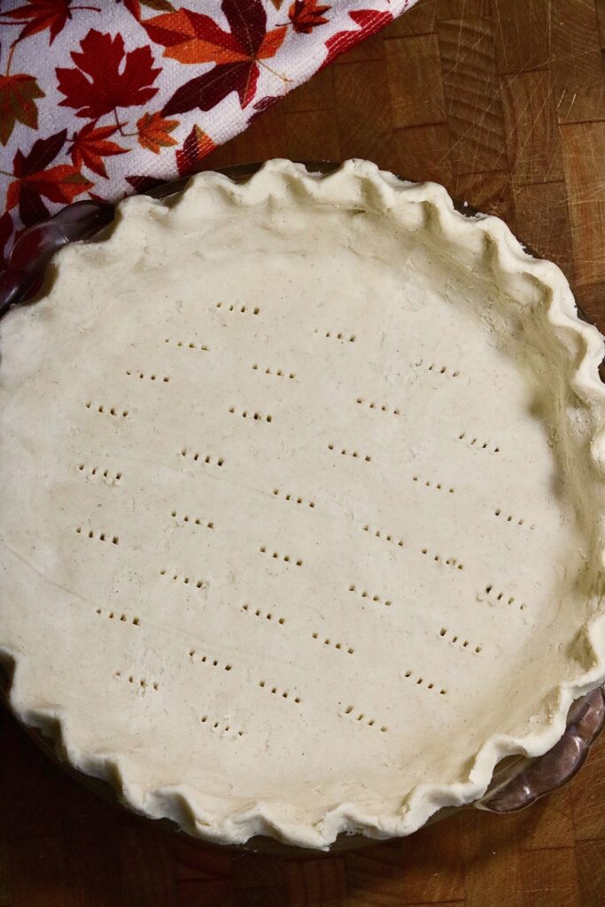 vegan gluten fre pie shell in pie plate ready to bake