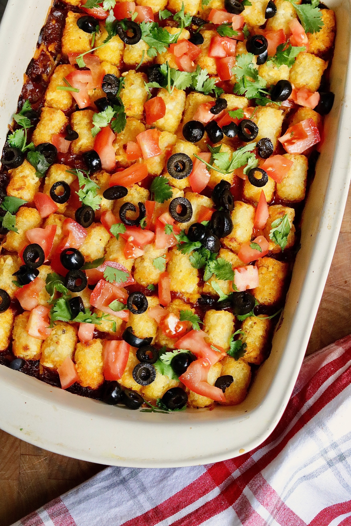 vegan tater tot casserole baked in dish and ready to serve
