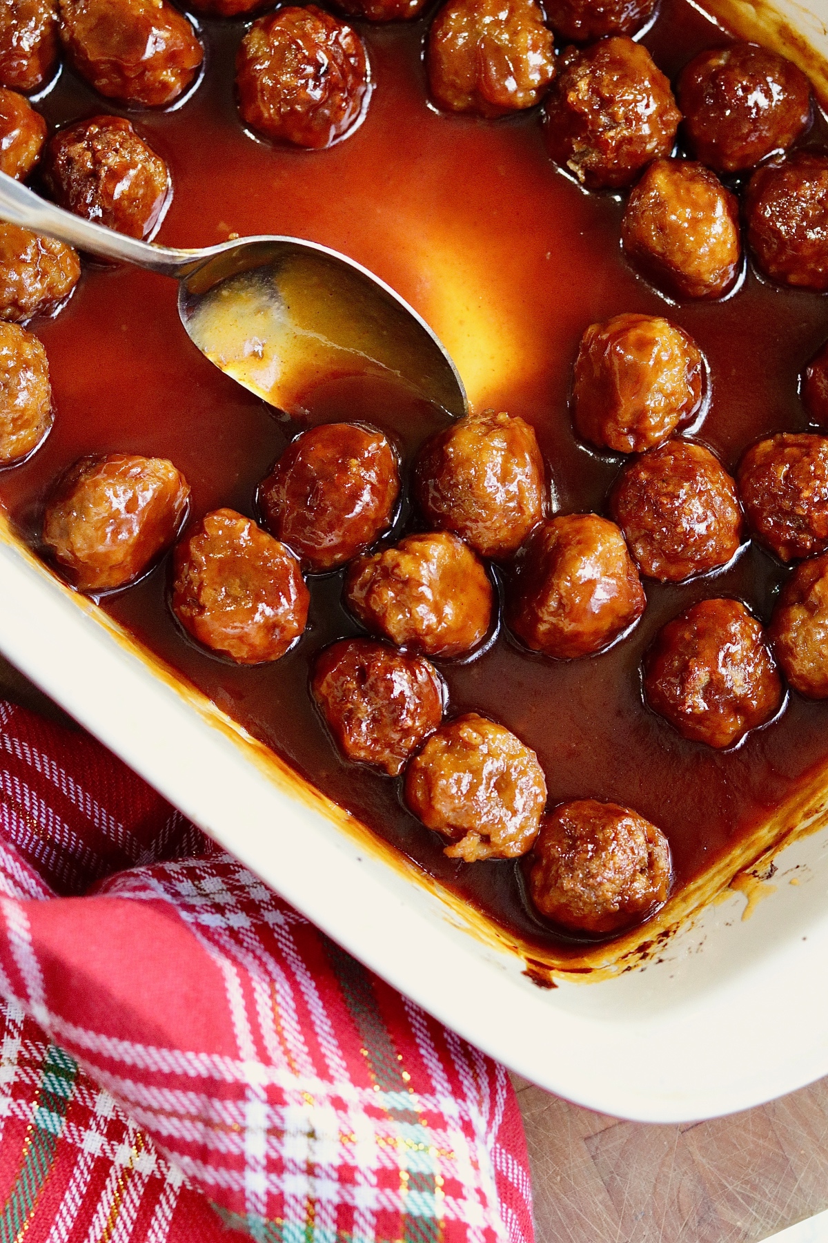 vegan grape jelly cocktail meatballs baked in a casserole dish