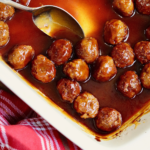 vegan grape jelly cocktail meatballs baked in a dish