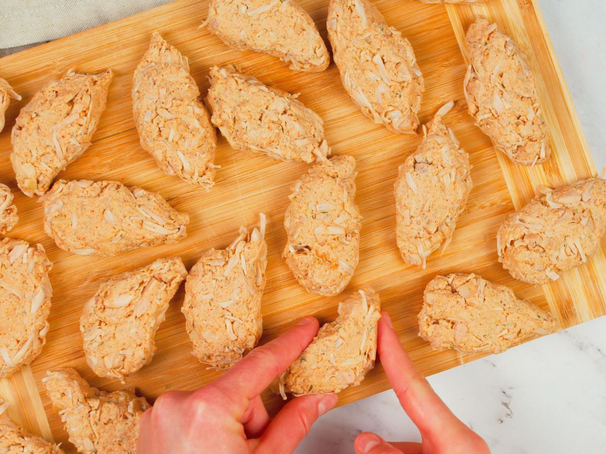 cutting board with multiple vegan wings before cookin