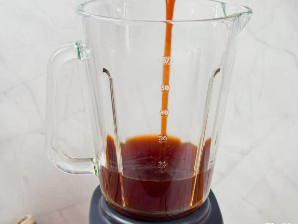 coffee being poured into blender