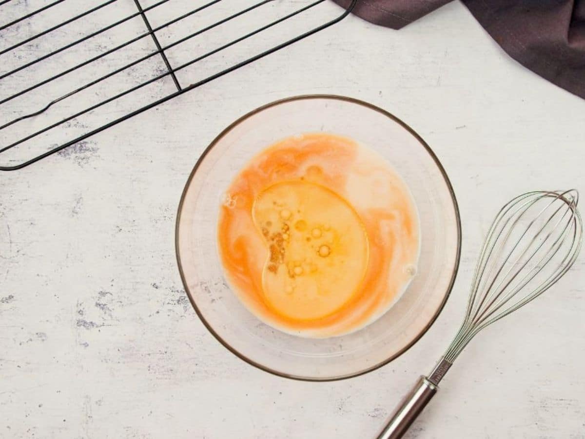 eggs and milk in mixing bowl