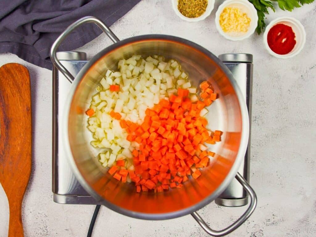 carrots and onions in large stockpot