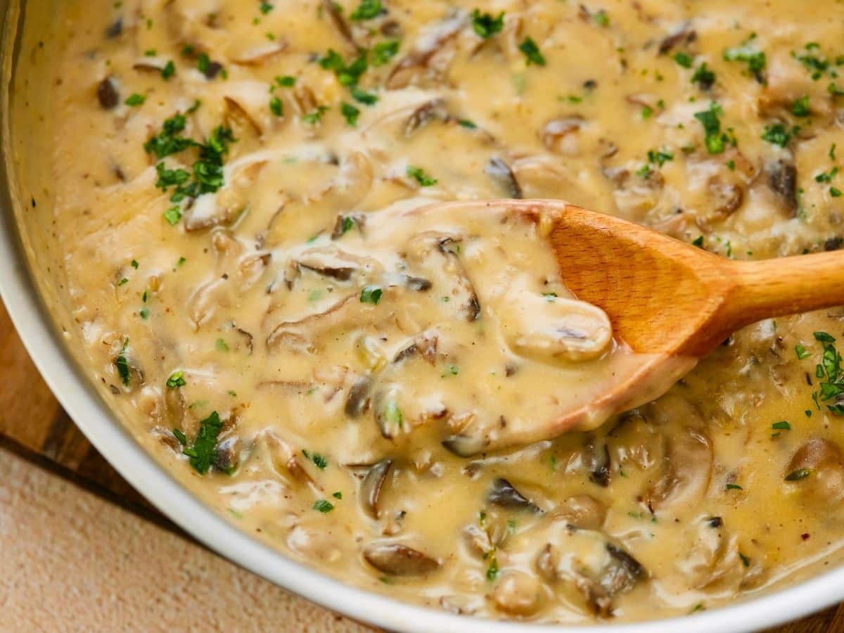 wooden spoon in mushroom stroganoff in skillet