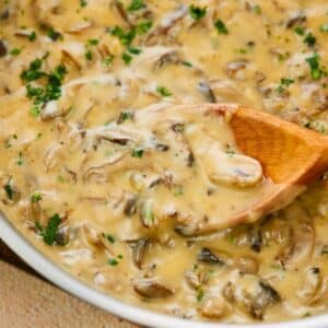 wooden spoon in mushroom stroganoff in skillet