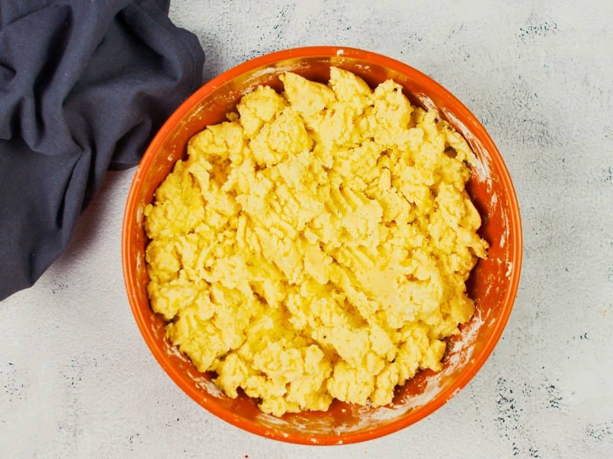 orange bowl of mashed potatoes