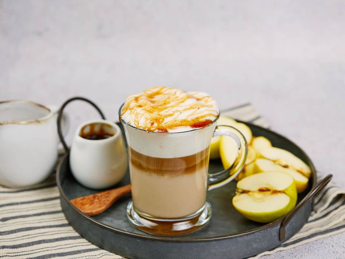 round gray platter on table holding vegan apple crisp macchiato