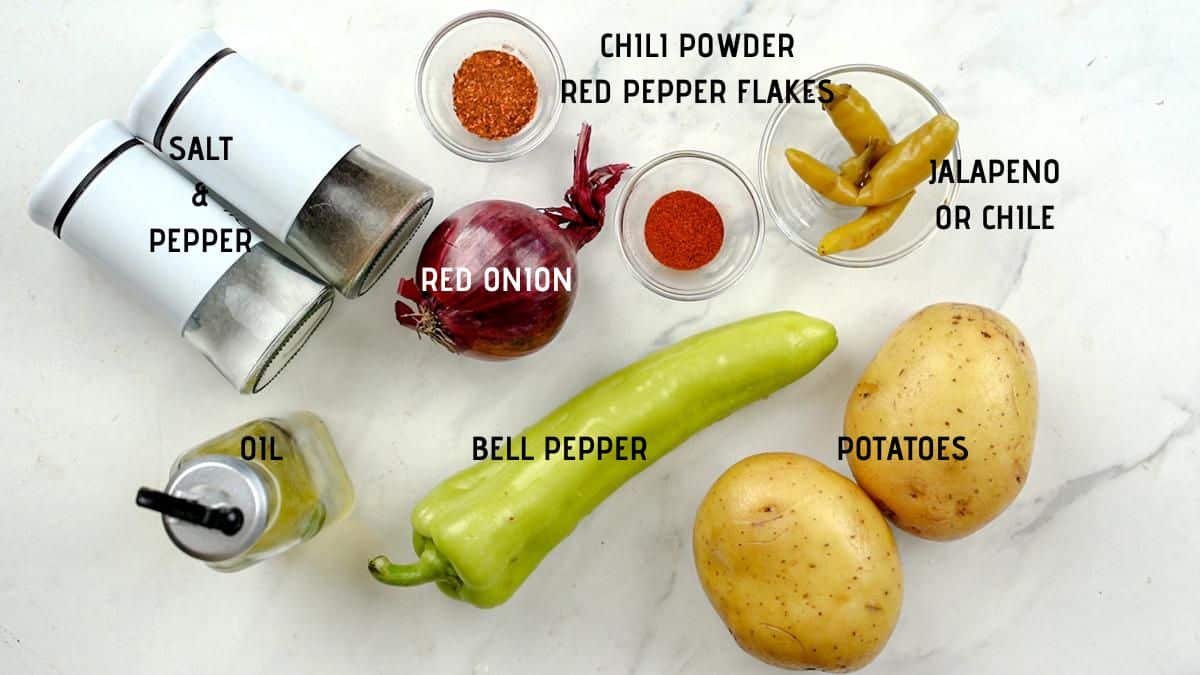 ingredients for spicy potato bowls on white table