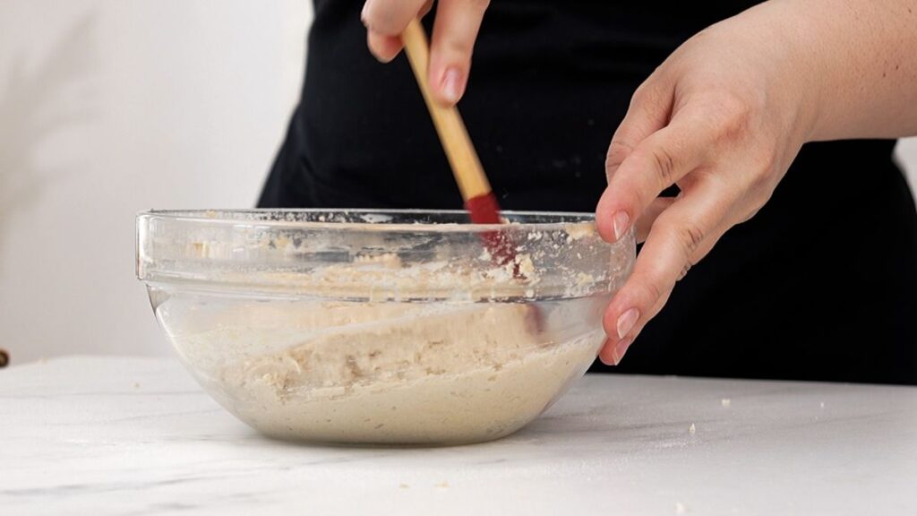 flour being mixed  into batter