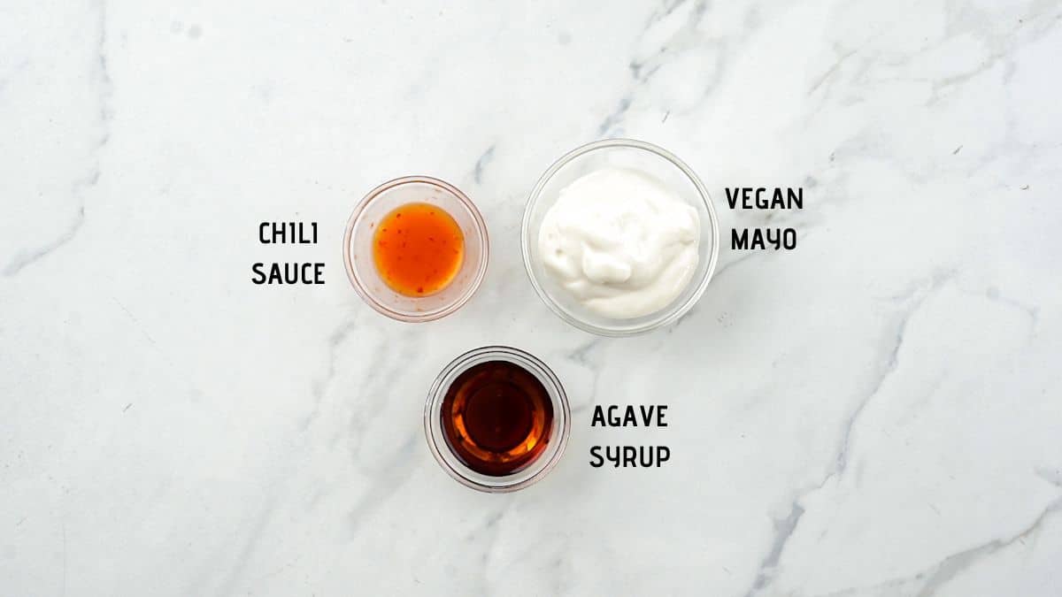 three bowls of ingredients on marble table