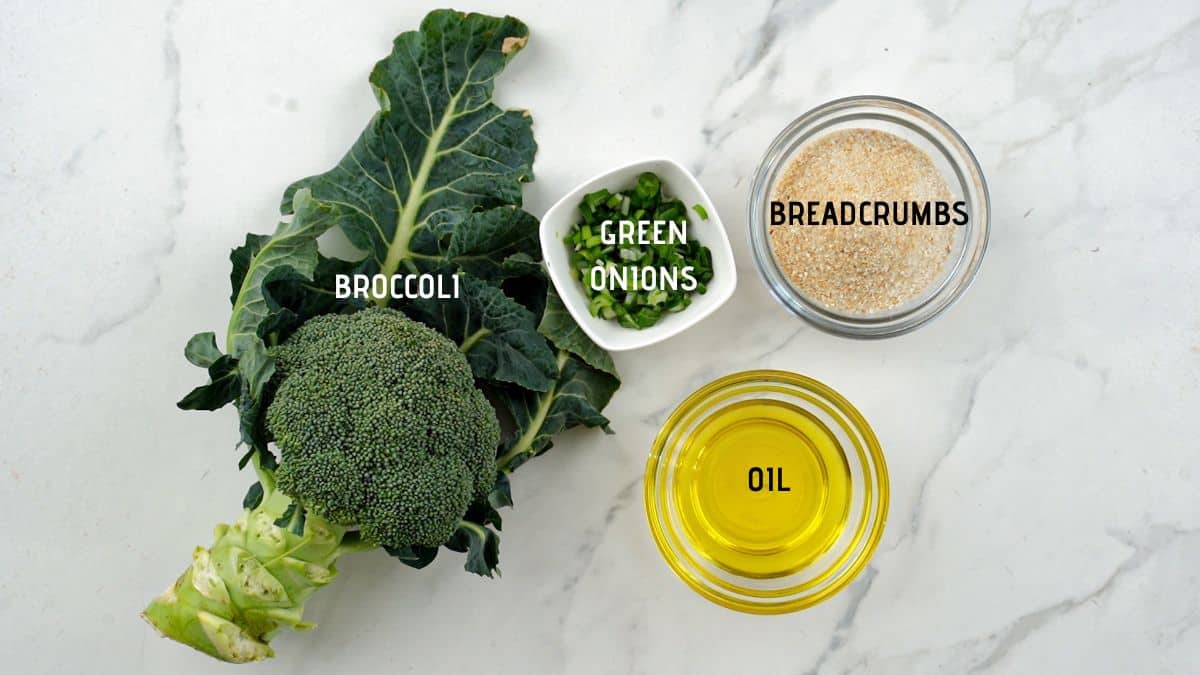 broccoli on table next to bowls of ingredients