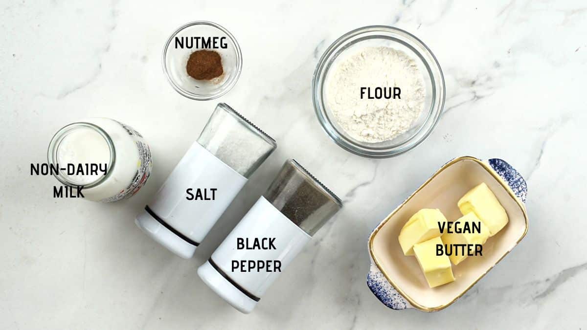 labeled image of ingredients in bowls on white marble table