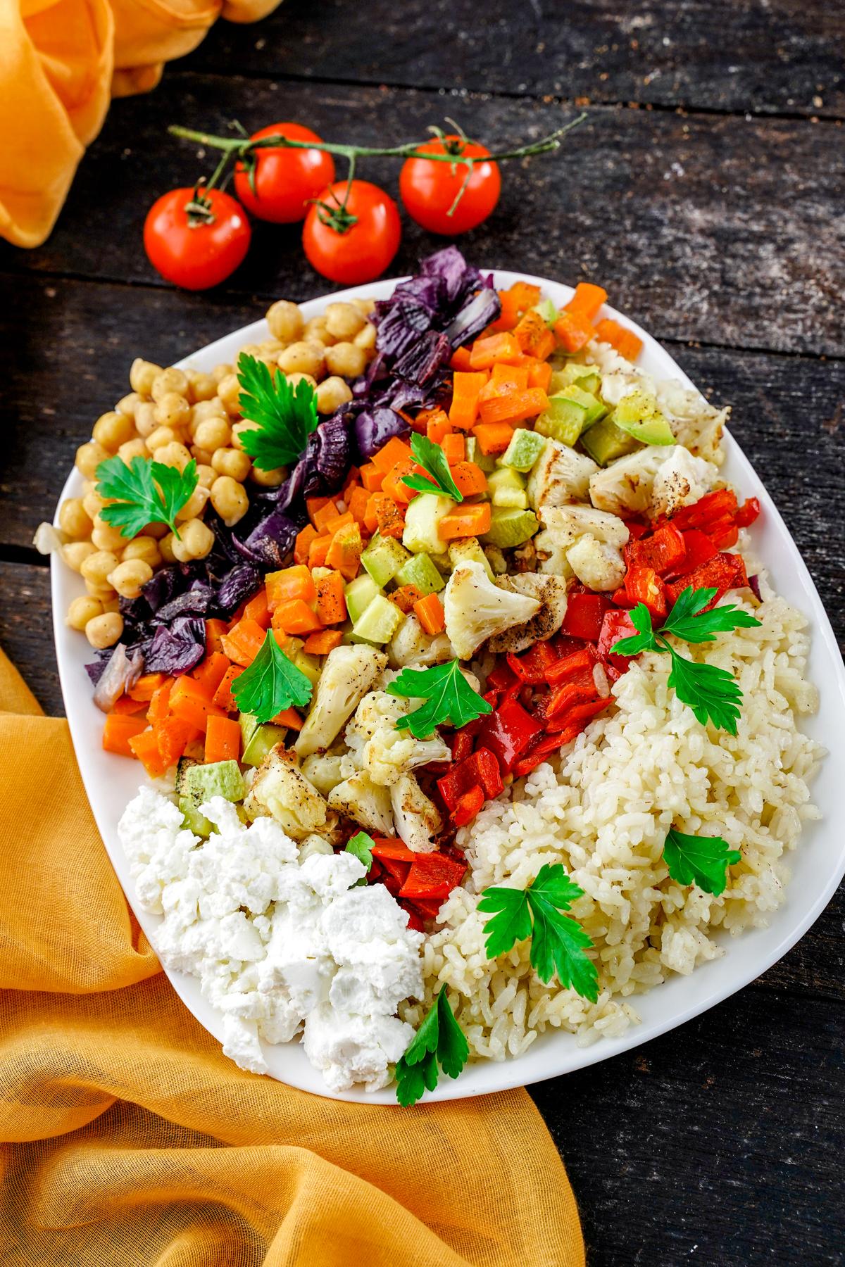 square white plate of vegetable rice salad