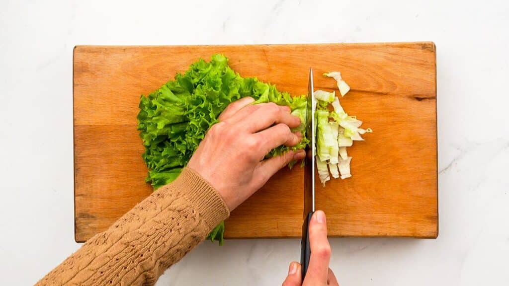 lettuce being chopped