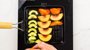 sliced peaches on grill pan