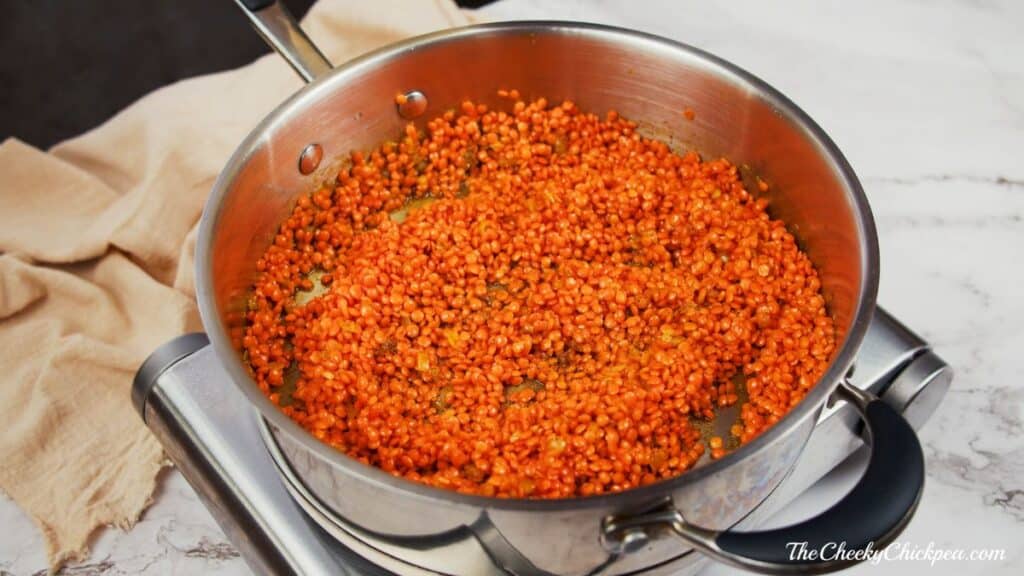 red lentils in skillet on hot plate