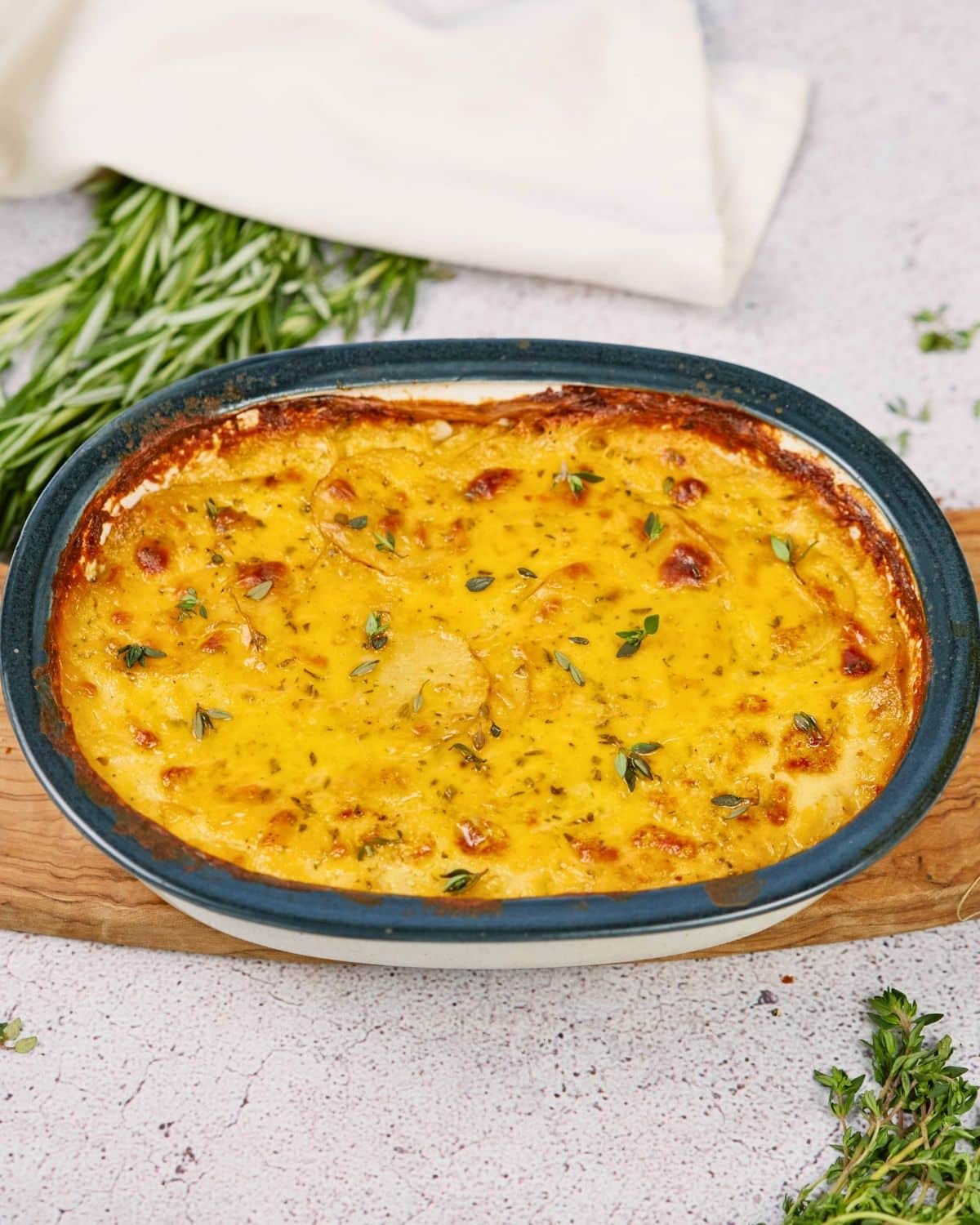 large baking dish of vegan scalloped potatoes