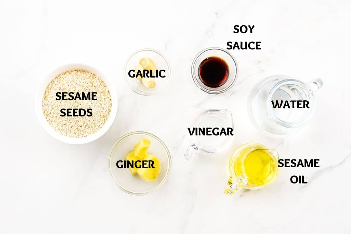 ingredients on white table in small glass bowls and ramekins