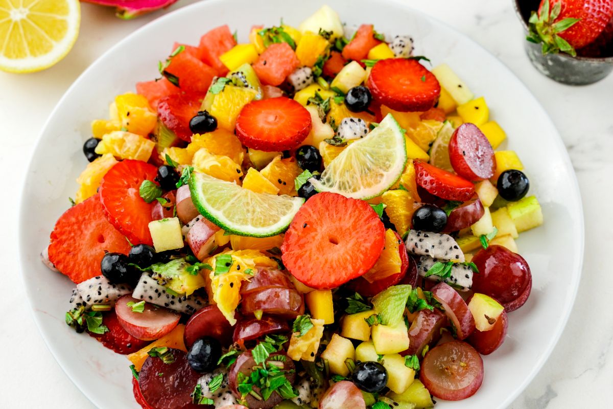 bowl of fruit salad on white table